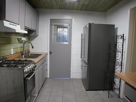 Kitchen with Stainless steel appliances and plenty of storage