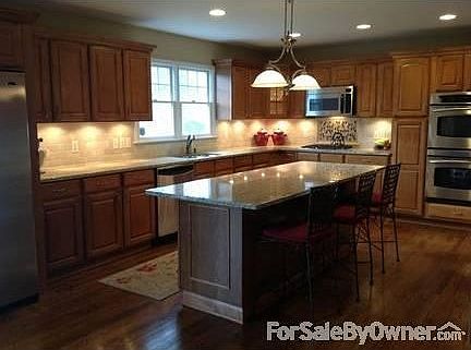 Kitchen
						:
						GE Profile gas appliances - stainless steel, double oven, granite counter tops