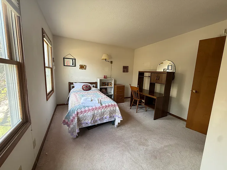 Bedroom #3: single bed, walk in closet and desk