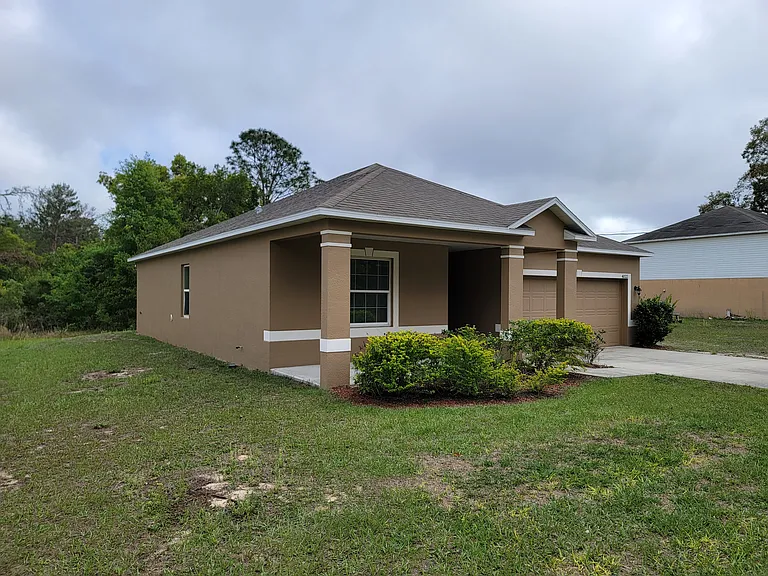 Front of home with covered porch