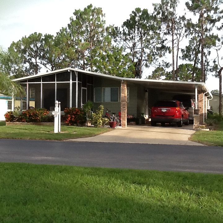 Front with carport for 2 car