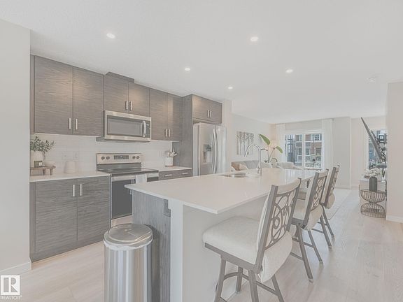 4th image of 2426 Trumpeter Way NW