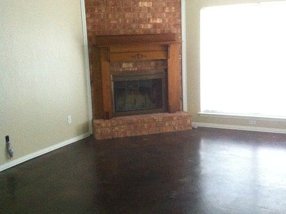 Living Room looks out to pool and large covered patio