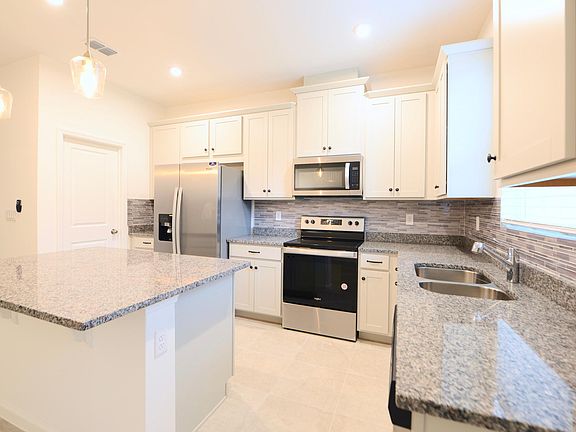4th image of 1180 Lakeshore Breeze Pl