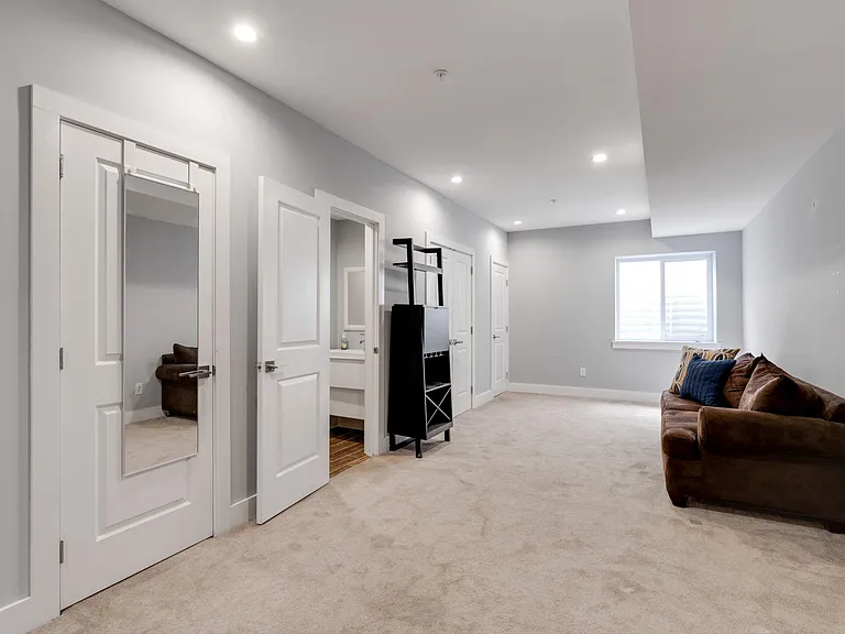 Finished basement/bedroom + half bath and storage/closet space