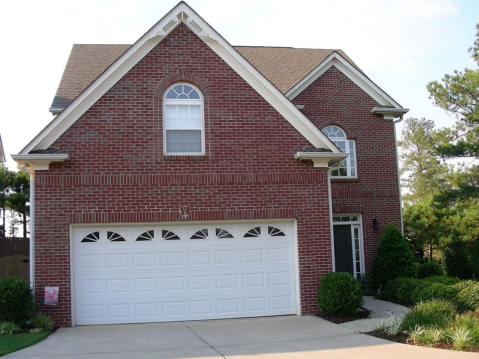 BRICK FRONT & CONCRETE SIDING