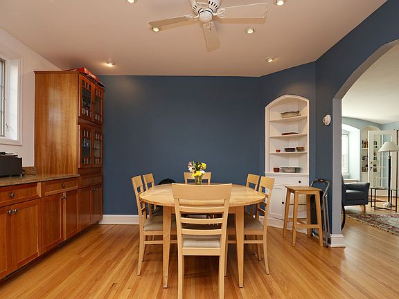 dining area has two charming corner cupboards