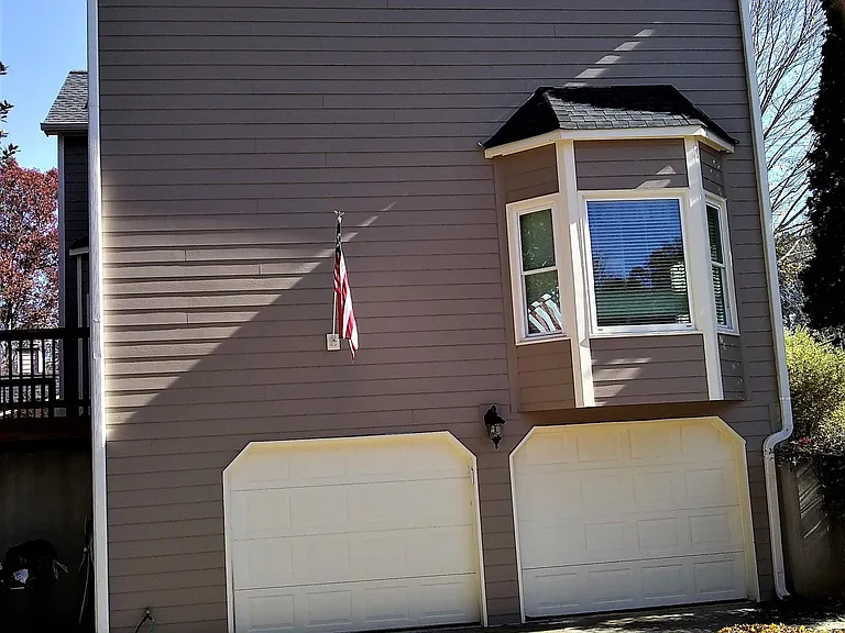 Side view to expansive 2 car garage.