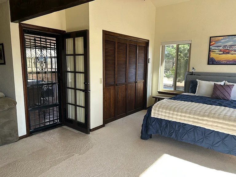 The Master Suite has an entrance to the upstairs solarium. Close the door and you have privacy.