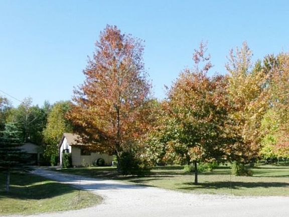 The front of the home is beautiful in the summer and fall!