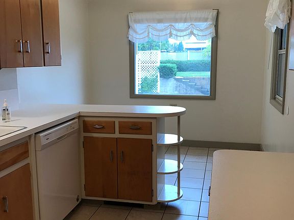 Kitchen nook with view of back yard