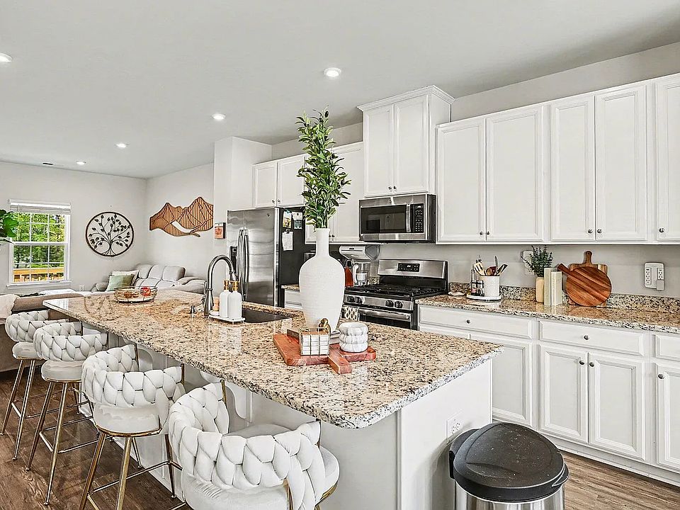 upgraded stainless steel appliances and granite countertops