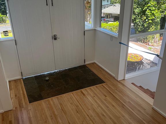 Entryway, with stairs leading to the garage