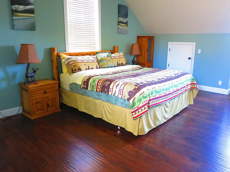 Spacious master bedroom is upstairs