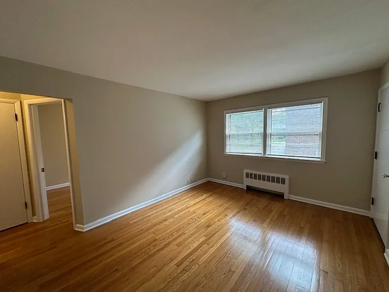 Cozy 1BR in Riverwest $925 Heat Included | Hardwood Floors | Storage + Laundry — Photo 11