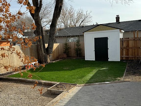 Backyard shed, fully fenced and landscaped back yard.