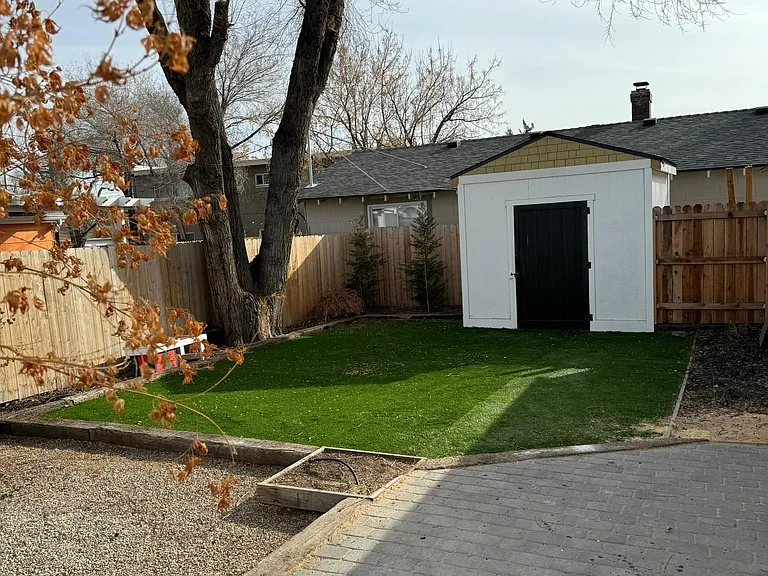 Backyard shed, fully fenced and landscaped back yard.