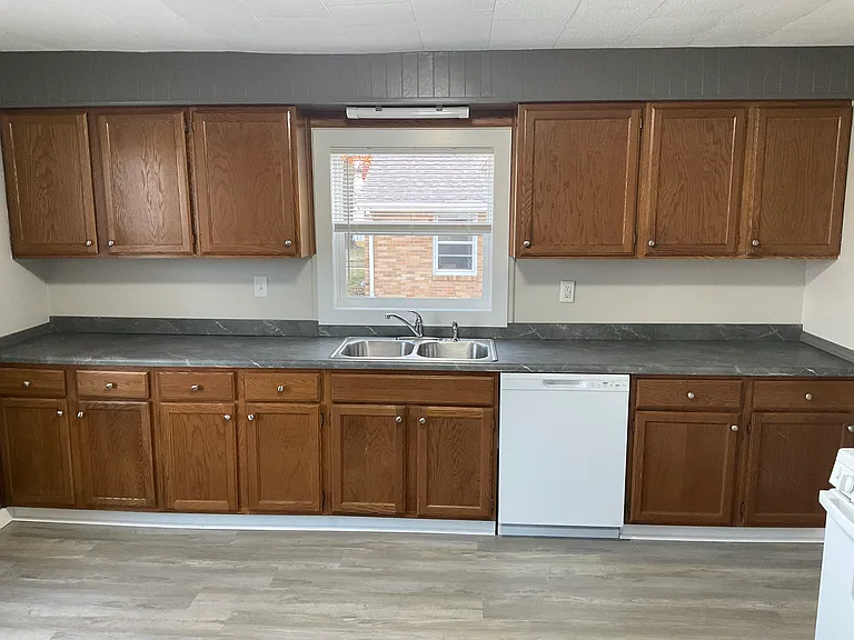 Tons of cabinets! And a BRAND NEW 12' countertop. ALL NEW PLUMBING and appliances too