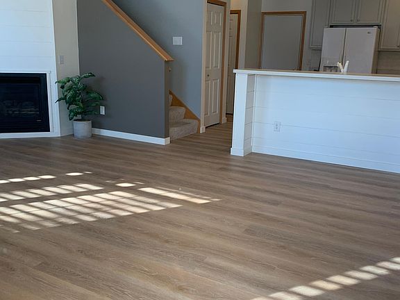 Welcome home! Walk into living room/dining room plenty of space to make this feel like home! Enjoy these new luxury vinyl plank floors!!