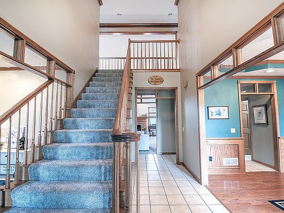 Foyer with an open staircase