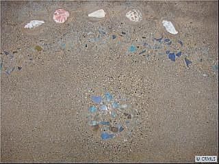 Sea-blue tiles and shells demonstrate attention to detail.
