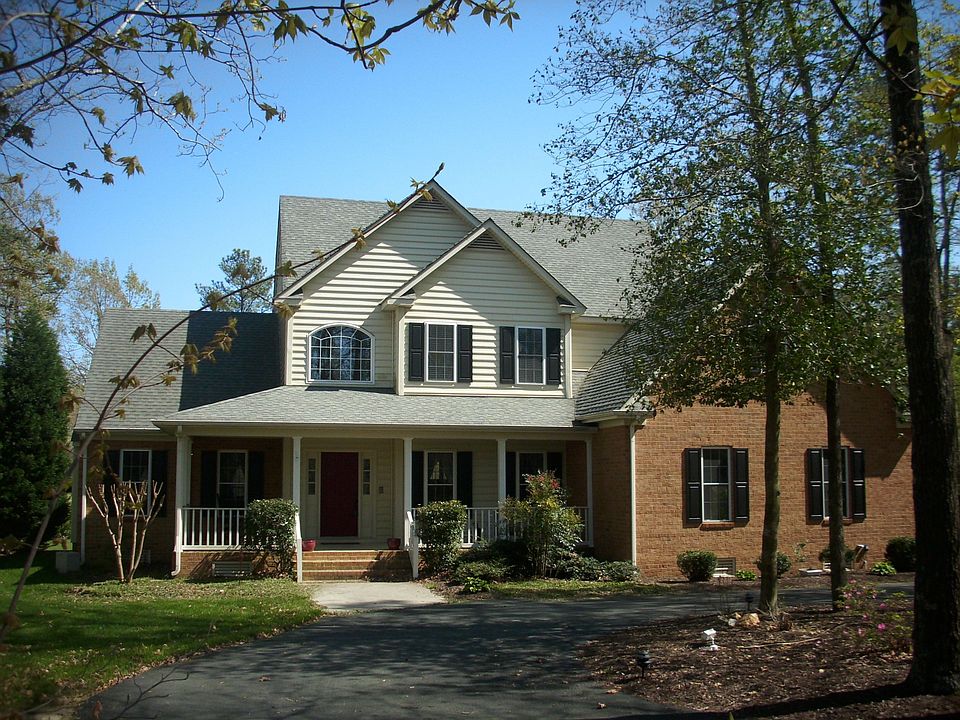 Stunning corner lot with circular driveway!