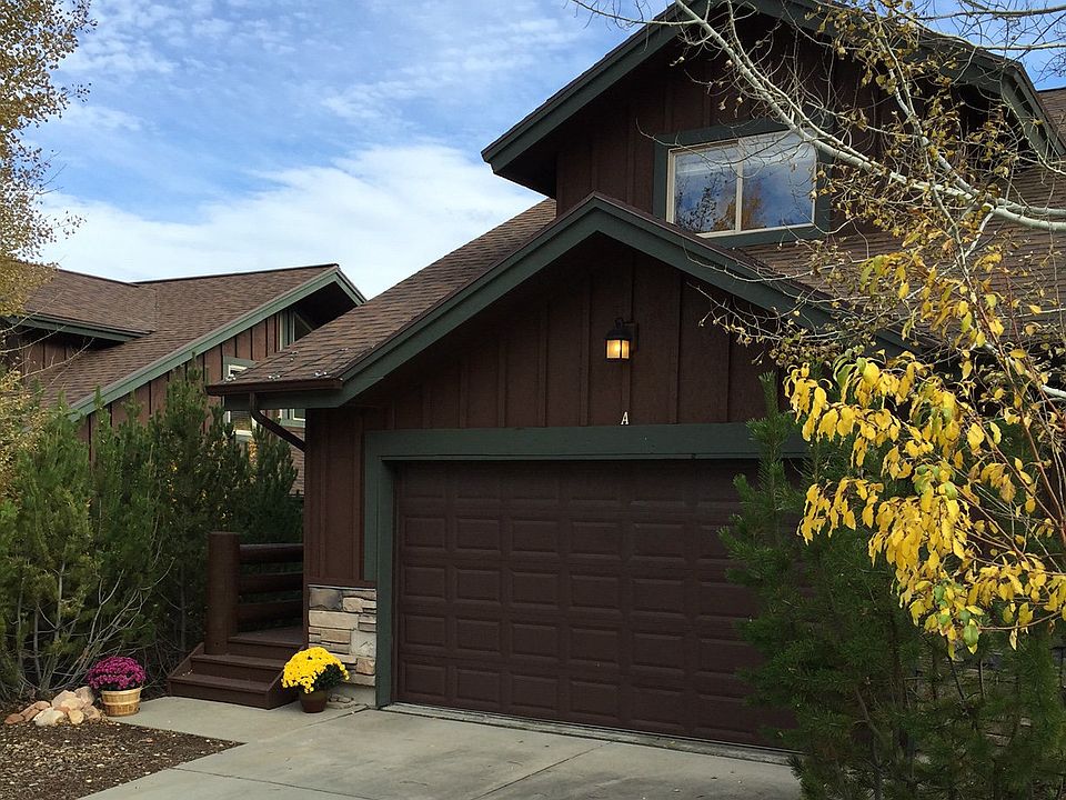 Front of home w/ oversized 2 car private garage