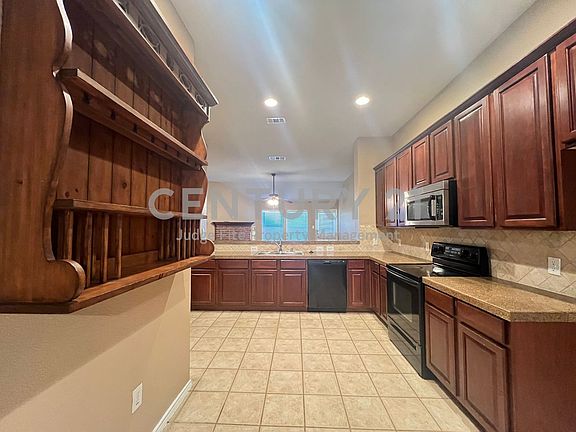 4th image of 9824 Fillmore Dr