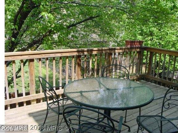 Large Deck Overlooking Wooded Area