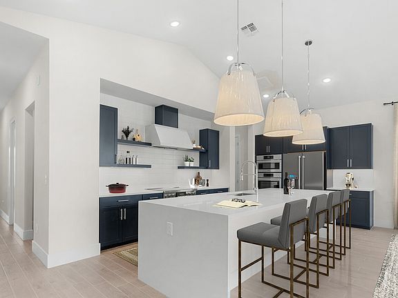 Kitchen with waterfall edge island