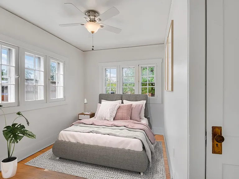 Bedroom 2 - office space. This image shows a virtually furnished space. Bedrooms come unfurnished.