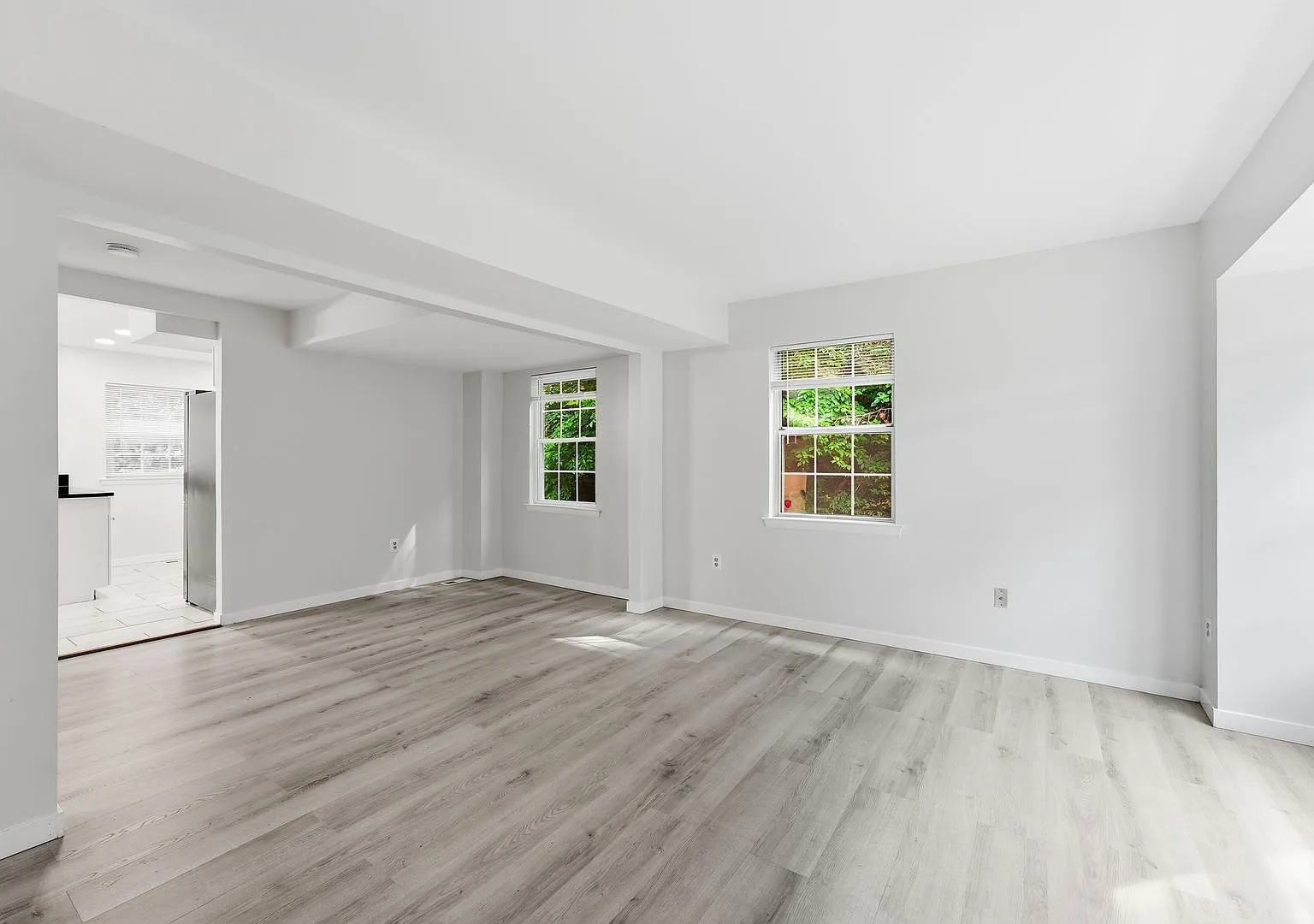 Welcome home to this beautifully updated end unit residence that combines modern finishes with sp... — Photo 3