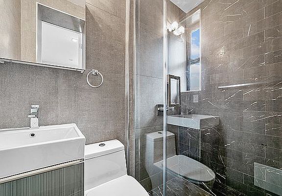 5th image of 326 E 117th St APT 26