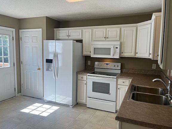 Lovely open floor plan that enables you to talk to guests from the kitchen to the living room