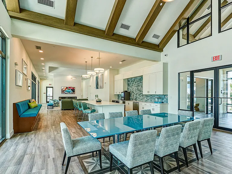 Imperial Crossing Luxury Apartment Homes community clubhouse seating area.