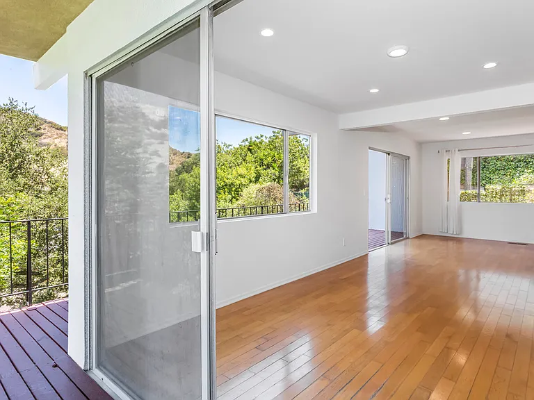 Off the deck into open indoor area.