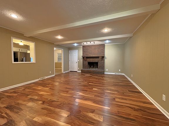 Living Room with Kitchen to left