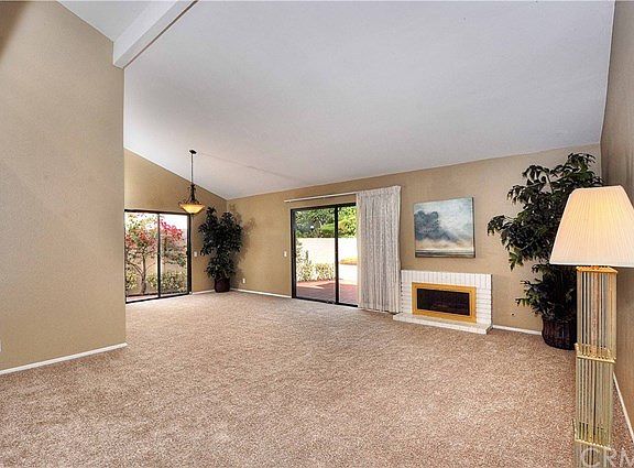 Living Room w/Vaulted Ceilings ; New Carpeting Throughout