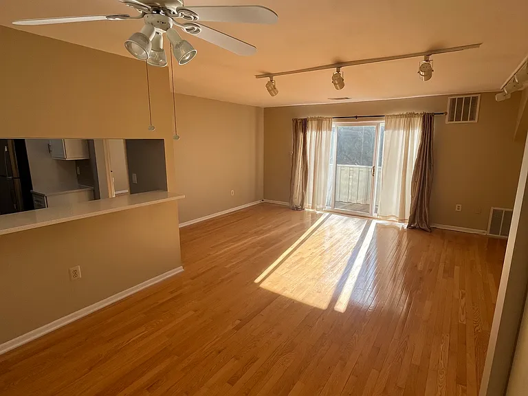 Dining Area W/Breakfast Bar & Living Room