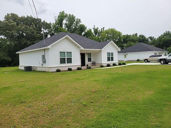 Overhang allows enough space for seating to enjoy the outdoors.