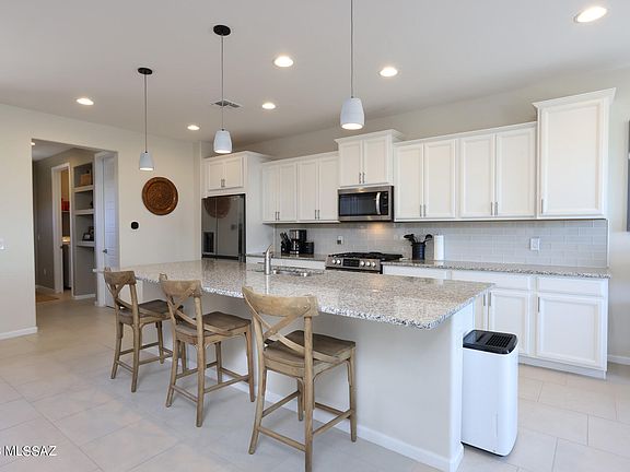 5th image of 7685 W Laurel Ln