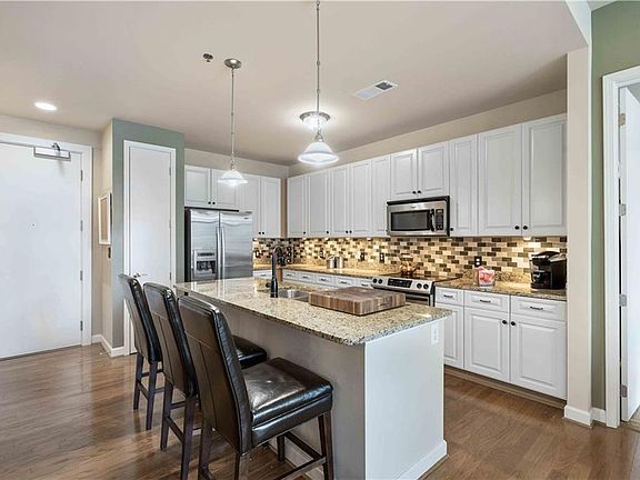 5th image of 711 Cosmopolitan Dr NE Unit 222