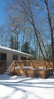 More wooded view from deck