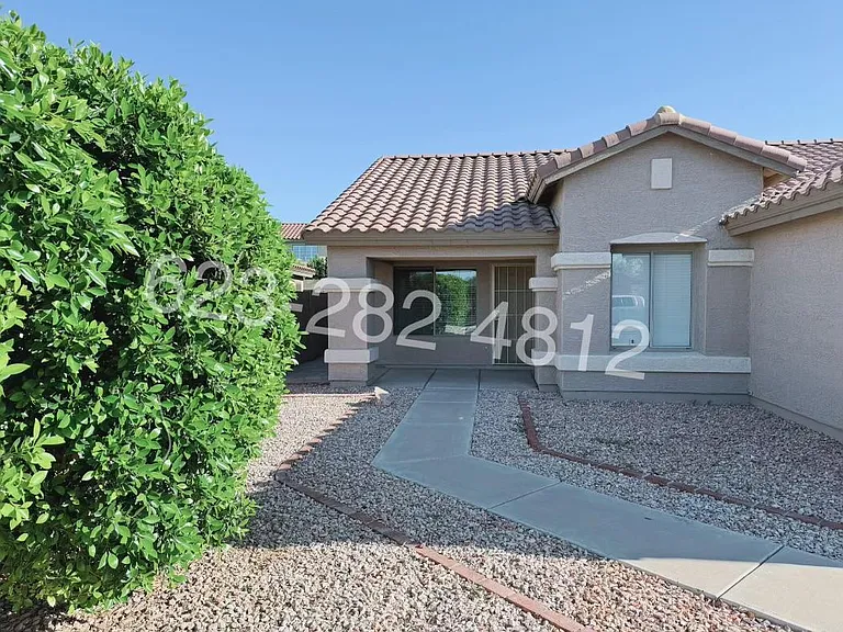 8556 W Carol Ave — Photo 2