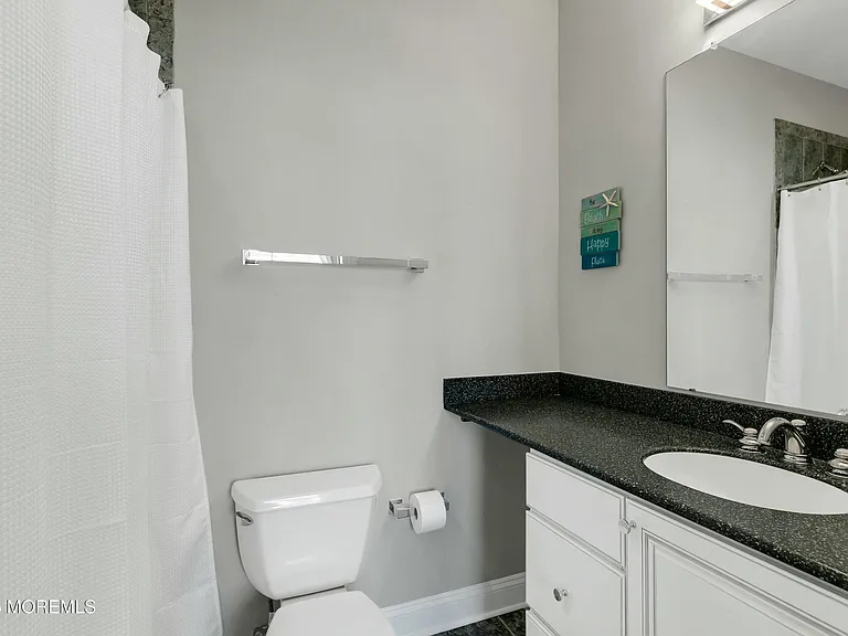 15 Tradewinds Ln — Photo 32