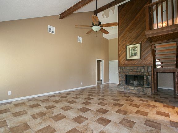 High ceilings and fireplace