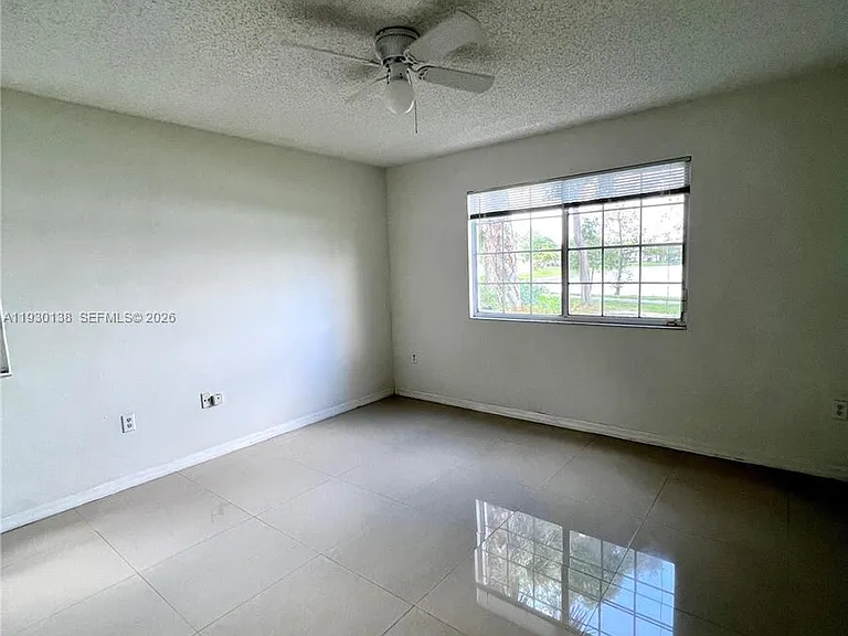 5061 Wiles Rd #102 — Photo 11