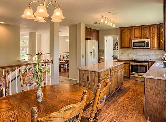 Spacious kitchen with large center island and breakfast area