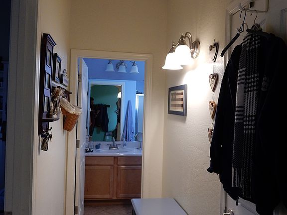 hallway to den/bath 1