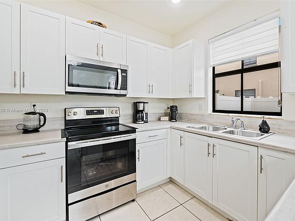 2nd image of 10852 W 33rd Ln #10852